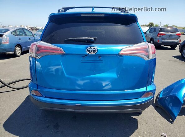 JTMZFREV4GJ063508 2016 TOYOTA RAV4 Blue 