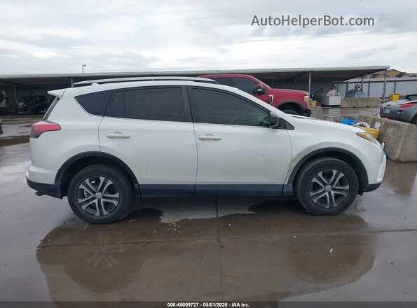 JTMZFREV4GJ093835 2016 TOYOTA LE White Вид задньої частини салону