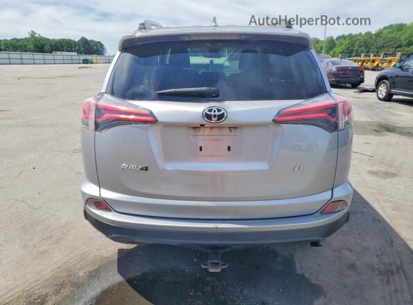 JTMZFREV7JD127319 2018 TOYOTA RAV4 Silver Вид ззаду