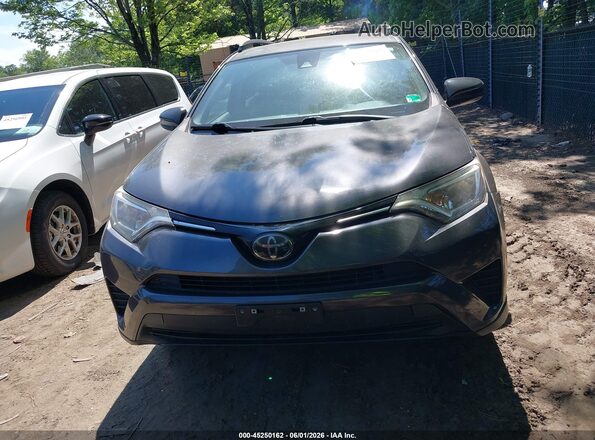 JTMZFREV7JJ155073 2018 TOYOTA RAV4 Black Vista interior trasera