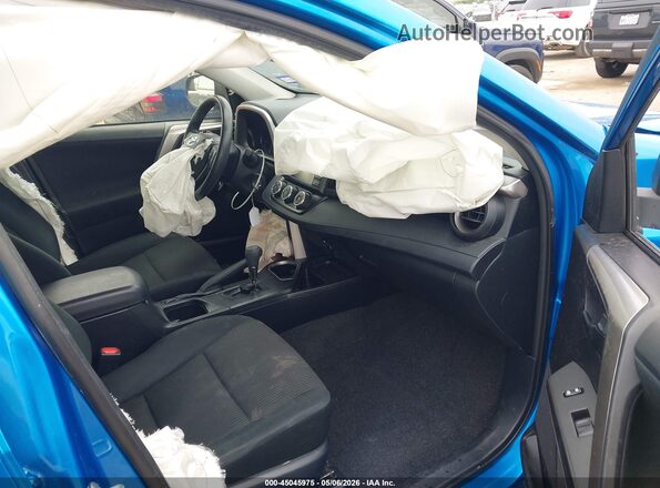 JTMZFREV7JJ735049 2018 TOYOTA LE Blue Vista interior delantera