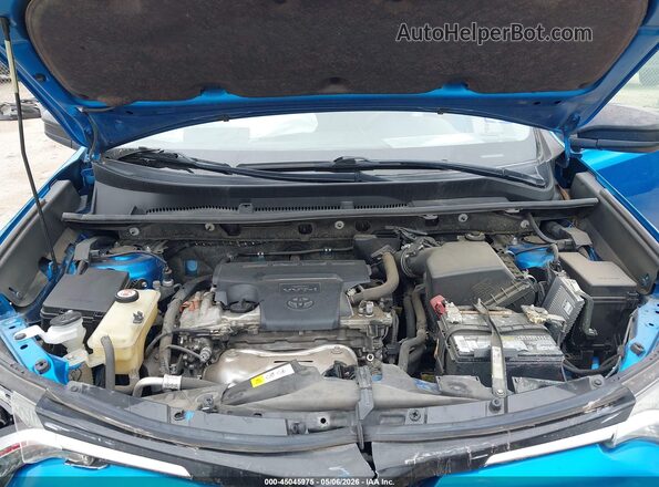 JTMZFREV7JJ735049 2018 TOYOTA LE Blue Vista trasera