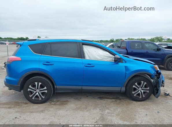 JTMZFREV7JJ735049 2018 TOYOTA LE Blue Vista interior trasera