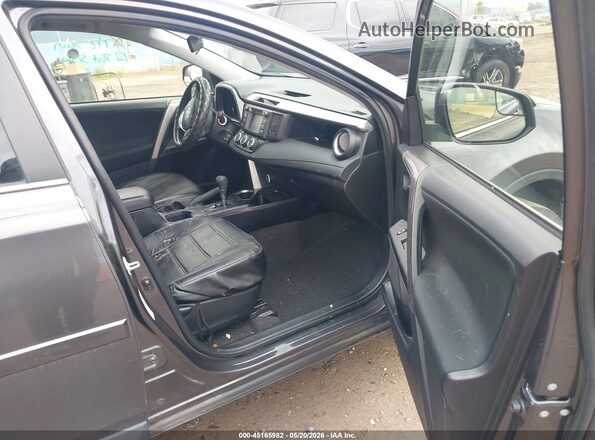 JTMZFREV7JJ744026 2018 TOYOTA RAV4 Gray წინა სალონის ხედი