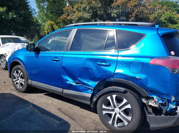 JTMZFREV8JJ180998 2018 TOYOTA LE Синий Вид задней части салона