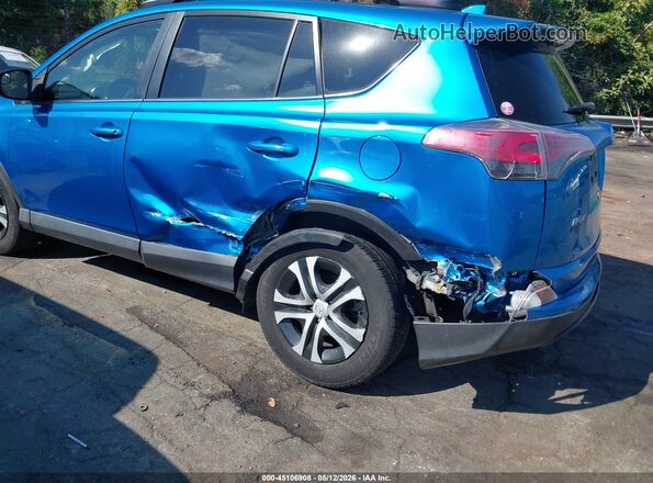 JTMZFREV8JJ180998 2018 TOYOTA LE Синий Вид спереди