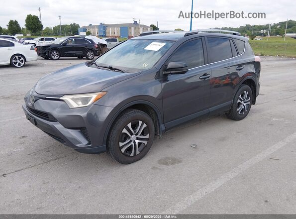 JTMZFREV9HJ709031 2017 TOYOTA RAV4 Gray Front left