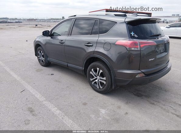 JTMZFREV9HJ709031 2017 TOYOTA RAV4 Gray Rear left