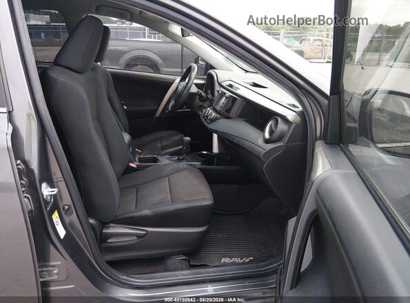JTMZFREV9HJ709031 2017 TOYOTA RAV4 Gray Front interior view