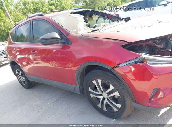JTMZFREVXHJ107108 2017 TOYOTA LE Red Vista interior trasera