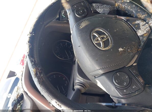 JTMZFREVXHJ107108 2017 TOYOTA LE Red Vista de los asientos traseros