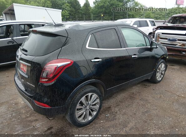 KL4CJASB1JB513580 2018 BUICK ENCORE Black Vista interior trasera