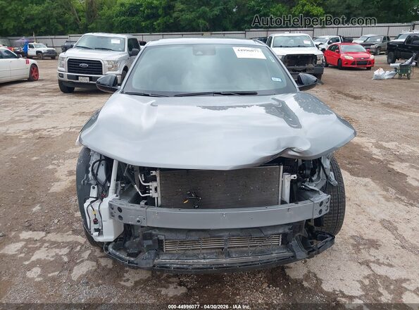 KL77LGEP1SC289859 2025 CHEVROLET TRAX Silver Սալոնի հետևի տեսք