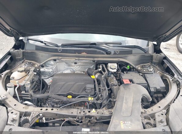 KL77LHE2XRC208555 2024 CHEVROLET TRAX Black Rear view