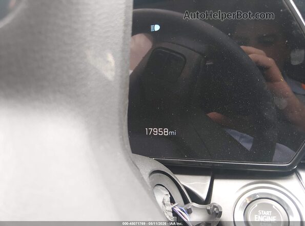 KL77LKEP4SC331203 2025 CHEVROLET TRAX Gray Vista de los asientos traseros