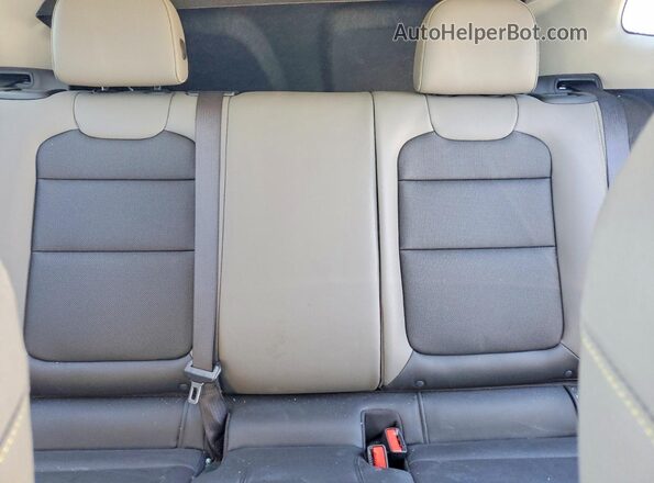 KL77LKEP5SC084788 2025 CHEVROLET TRAX Gray Vista de los asientos traseros