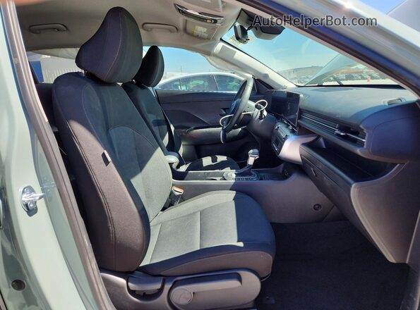 KM8HF3AB3TU386327 2026 HYUNDAI KONA Бирюзовый Вид салона спереди