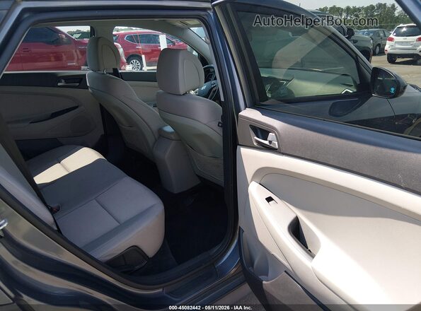 KM8J2CA44JU700899 2018 HYUNDAI TUCSON Blue Vista de la etiqueta del VIN
