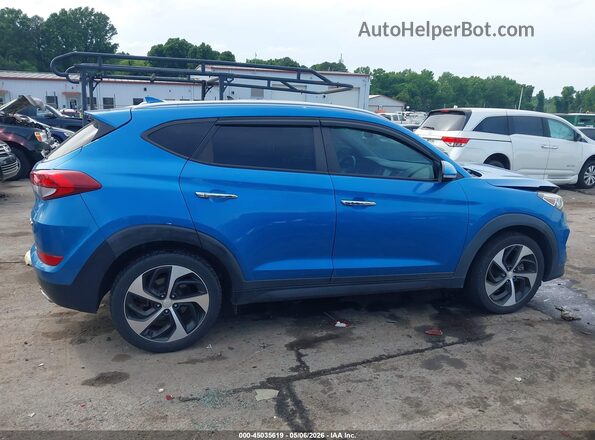 KM8J33A27GU140445 2016 HYUNDAI TUCSON Blue Widok wnętrza z tyłu
