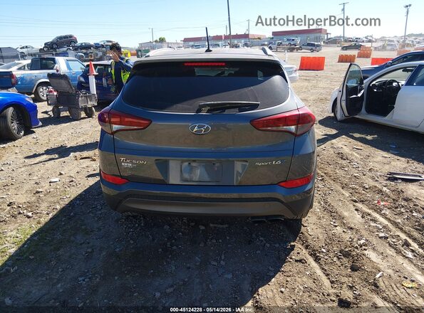 KM8J33A28GU027216 2016 HYUNDAI TUCSON Gray 
