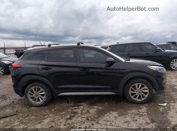 KM8J33A40HU348993 2017 HYUNDAI TUCSON Black Widok wnętrza z tyłu