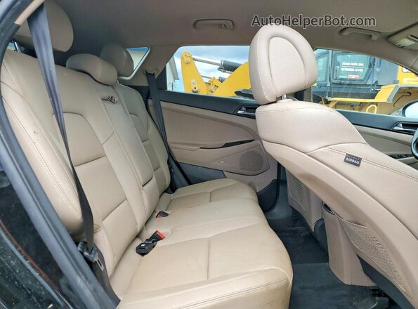 KM8J33A41HU418565 2017 HYUNDAI TUCSON Black Widok wnętrza z tyłu