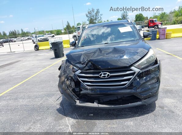 KM8J33A41JU651335 2018 HYUNDAI TUCSON Black Front view