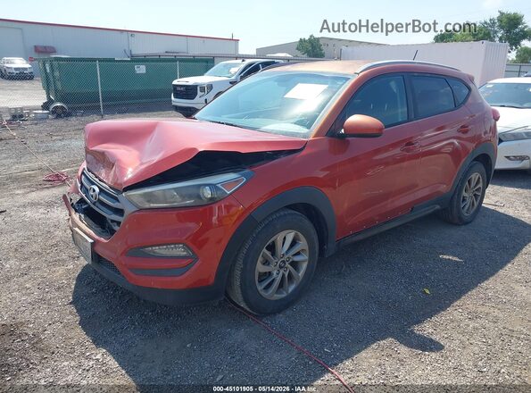 KM8J33A42GU075991 2016 HYUNDAI TUCSON Оранжевый Передняя левая четверть