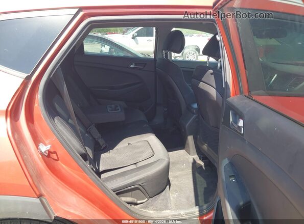 KM8J33A42GU075991 2016 HYUNDAI TUCSON Оранжевый Вид наклейки с VIN-кодом