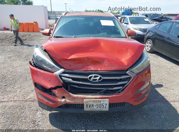 KM8J33A42GU075991 2016 HYUNDAI TUCSON Оранжевый Вид спереди