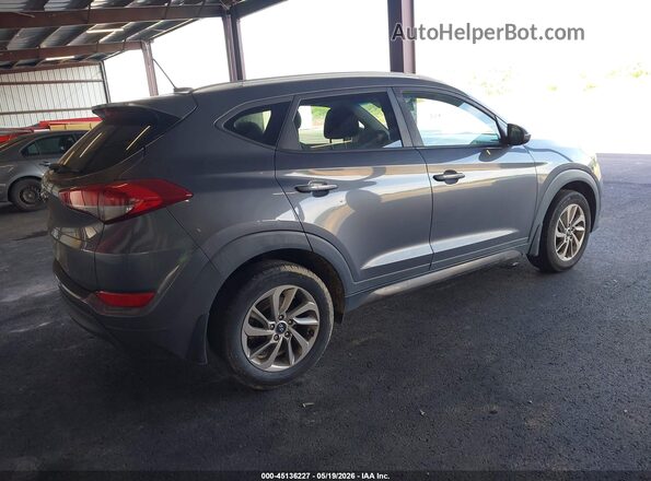 KM8J33A43GU186243 2016 HYUNDAI TUCSON Dark Blue 
