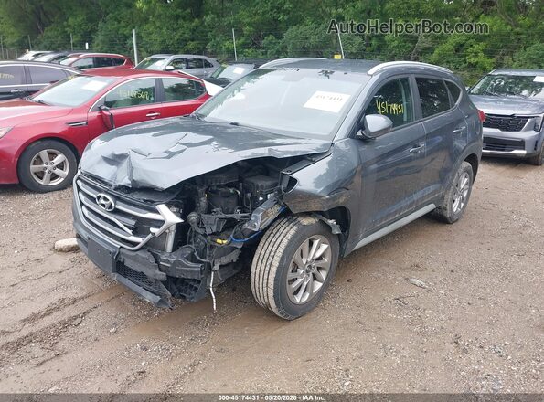 KM8J33A43JU620569 2018 HYUNDAI TUCSON Gray წინა მარცხენა ხედი სამი მეოთხედიდან