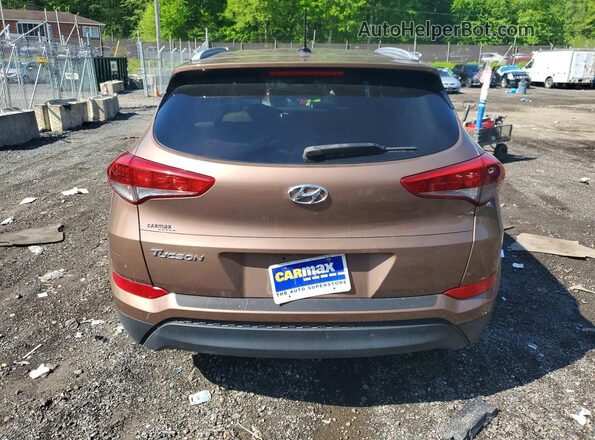 KM8J33A46GU186785 2016 HYUNDAI TUCSON Brown 