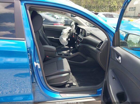 KM8J33AL0MU297321 2021 HYUNDAI TUCSON Blue Front interior view