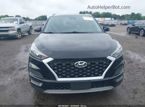KM8J33AL5MU296522 2021 HYUNDAI TUCSON Black Rear interior view