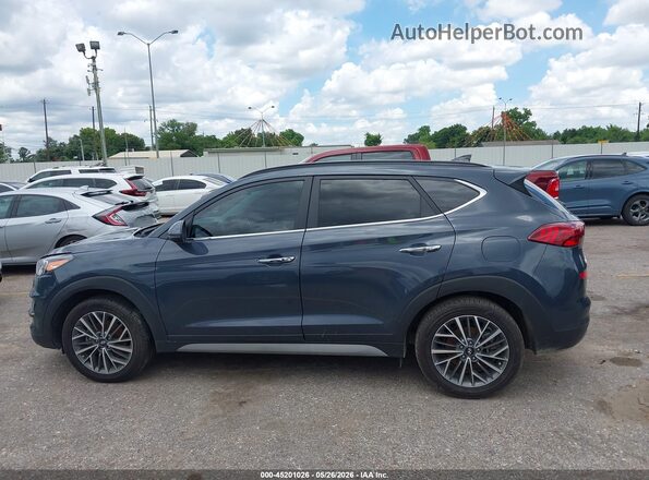 KM8J33AL5MU387113 2021 HYUNDAI TUCSON Gray Vista interior trasera
