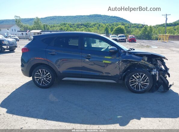 KM8J33ALXKU899396 2019 HYUNDAI TUCSON Blue Вид задньої частини салону