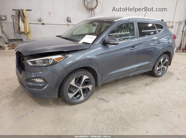 KM8J3CA27GU226502 2016 HYUNDAI TUCSON Gray 
