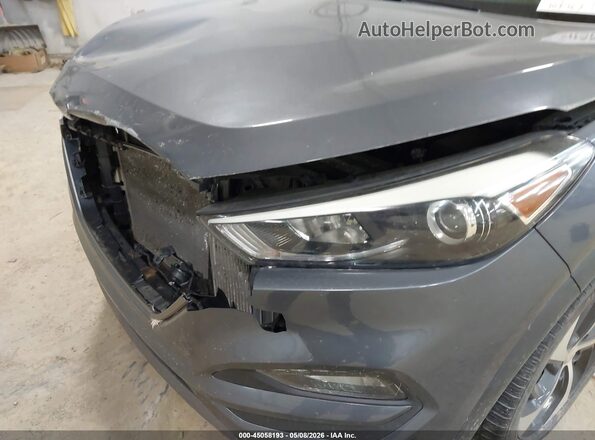 KM8J3CA27GU226502 2016 HYUNDAI TUCSON Gray 