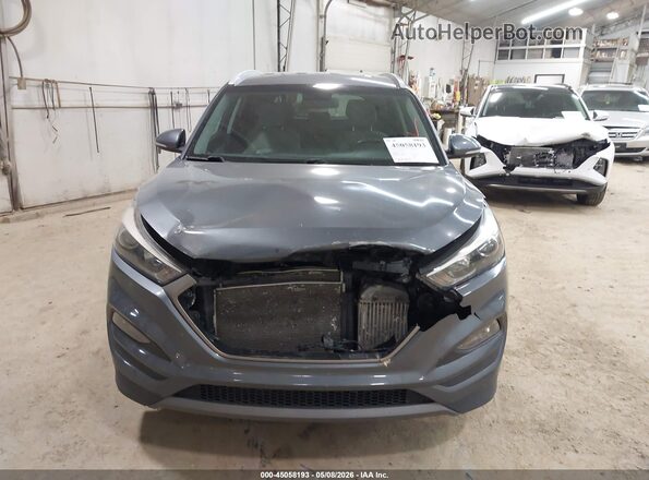 KM8J3CA27GU226502 2016 HYUNDAI TUCSON Gray 