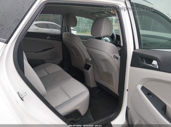 KM8J3CA2XHU423987 2017 HYUNDAI TUCSON White VIN კოდის სტიკერის ხედი