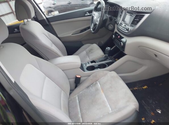 KM8J3CA40GU156875 2016 HYUNDAI TUCSON Черный Вид салона спереди