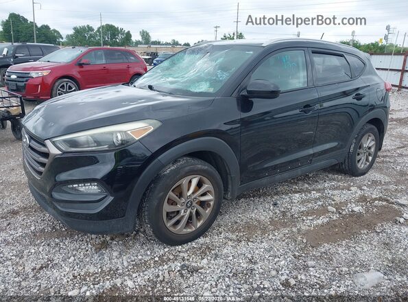 KM8J3CA40GU156875 2016 HYUNDAI TUCSON Черный Передняя левая четверть