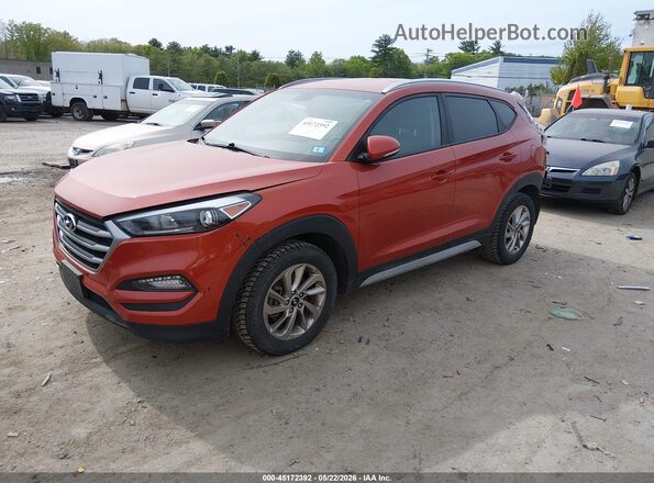 KM8J3CA41HU415214 2017 HYUNDAI TUCSON Оранжевый Передняя левая четверть