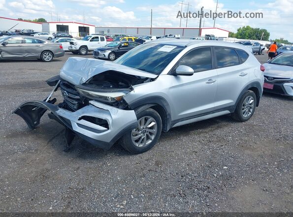 KM8J3CA44JU778662 2018 HYUNDAI TUCSON Серебряный Передняя левая четверть
