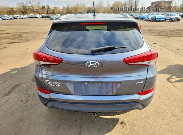 KM8J3CA49GU075342 2016 HYUNDAI TUCSON Blue Вид ззаду