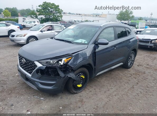 KM8J3CAL2MU299233 2021 HYUNDAI TUCSON Gray Trasero izquierdo