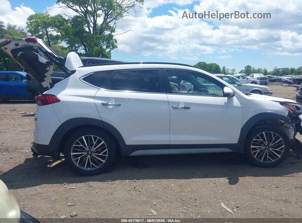 KM8J3CAL3KU059461 2019 HYUNDAI TUCSON White Սալոնի հետևի տեսք