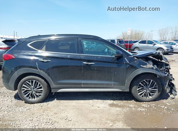 KM8J3CAL3MU374165 2021 HYUNDAI TUCSON Black Вид задньої частини салону