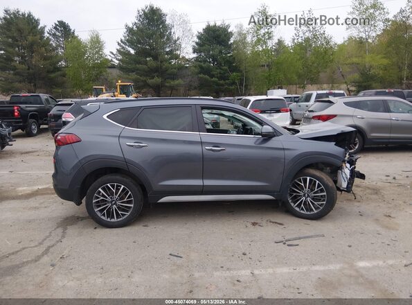 KM8J3CAL6MU409443 2021 HYUNDAI TUCSON Blue Սալոնի հետևի տեսք